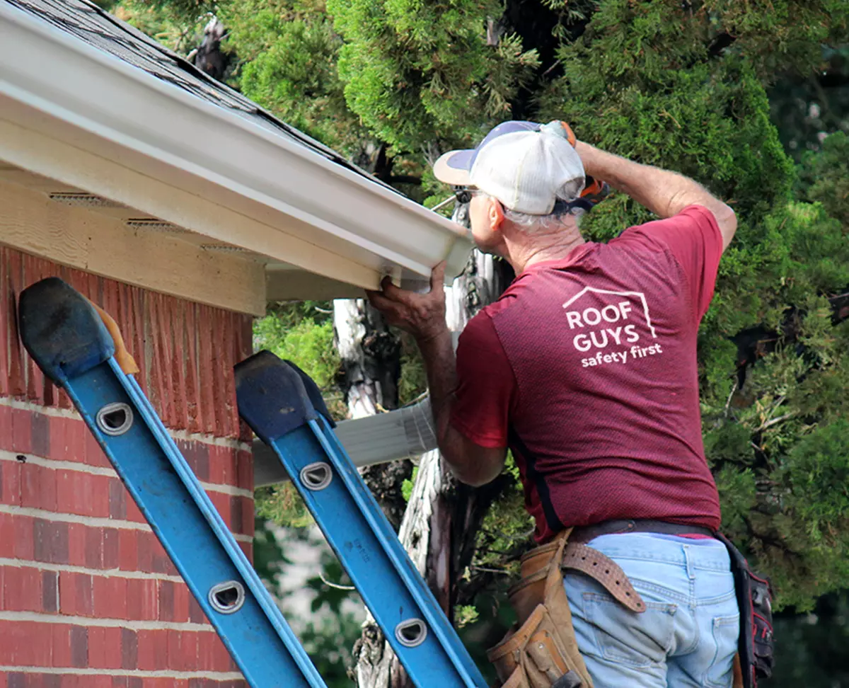 Roof contractor dressed in customized branded apparel