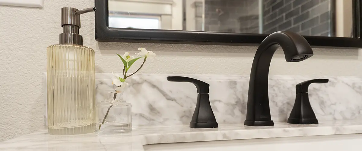 close-up photo of a matte bathroom faucet